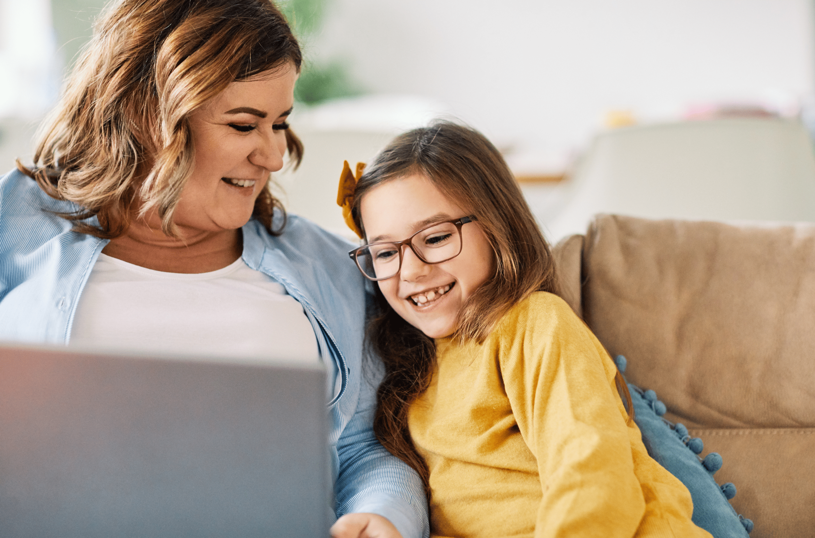 parent and student on laptop